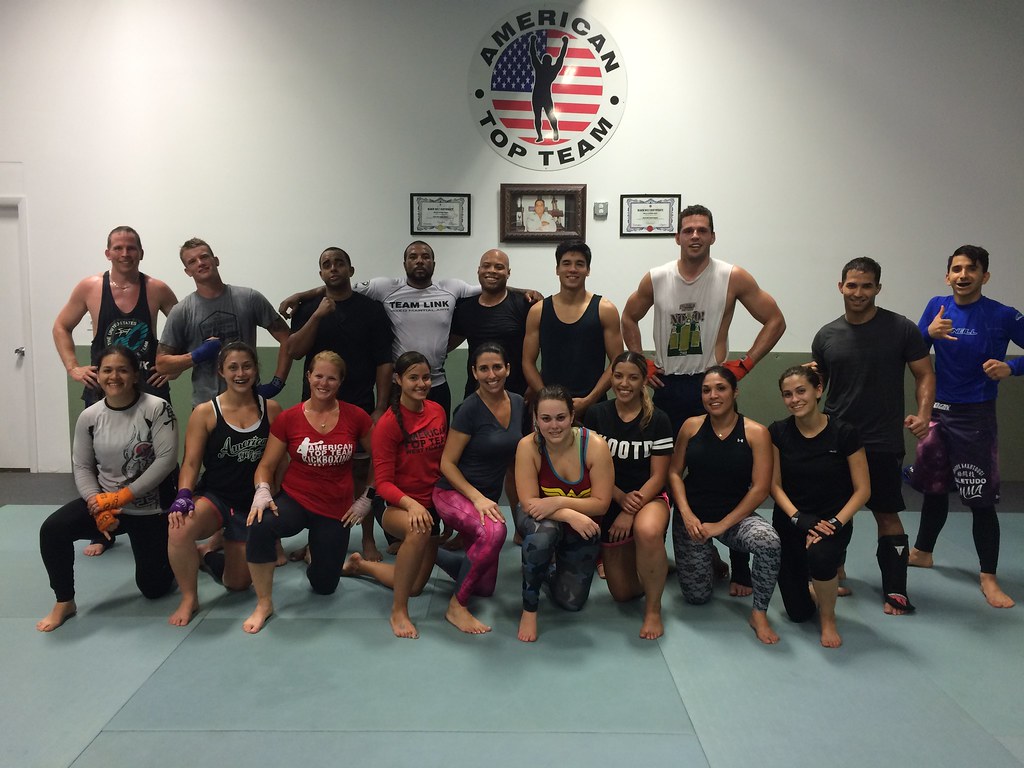Students posing together to show off the gym's friendly environment
